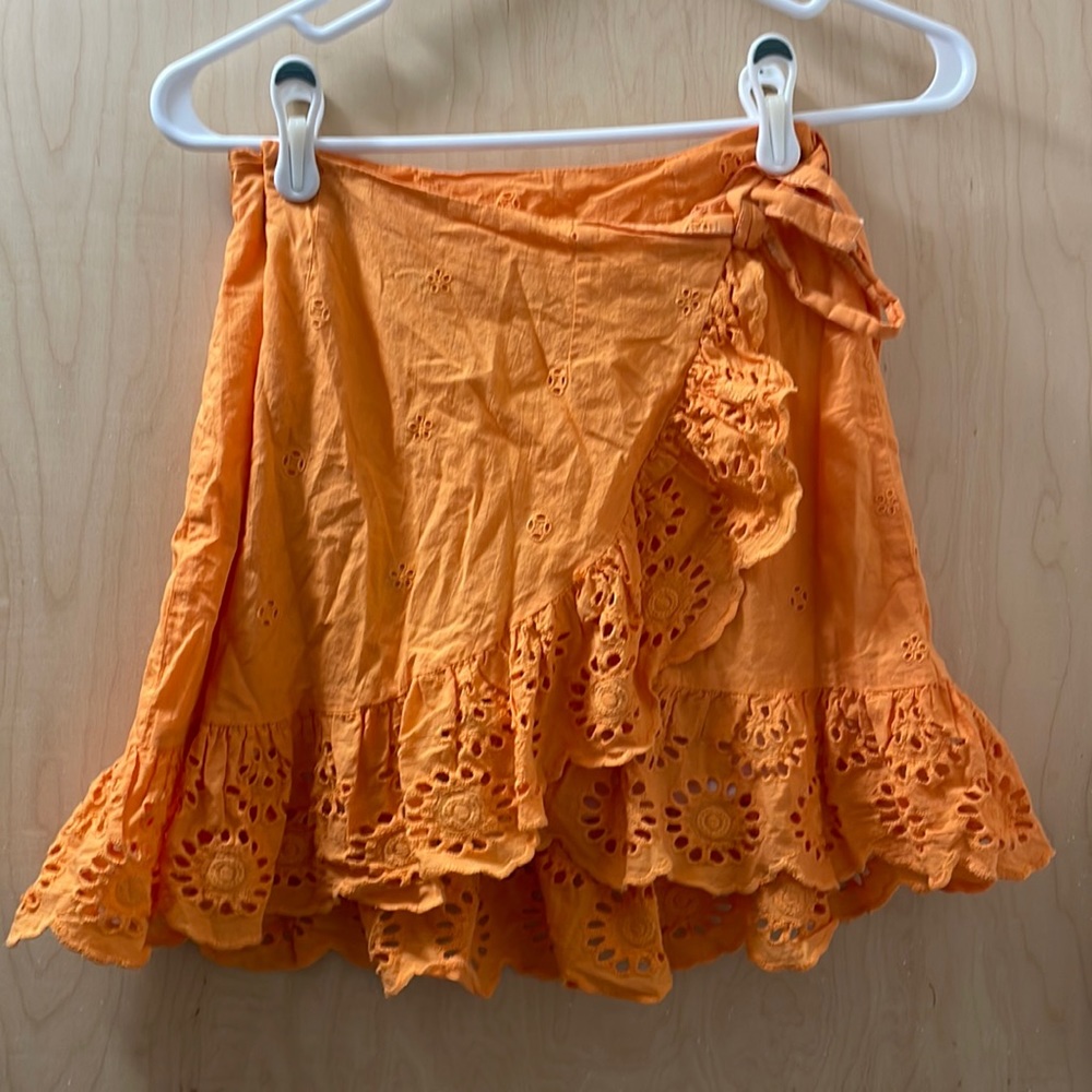 Hardly worn originally white and dyed orange